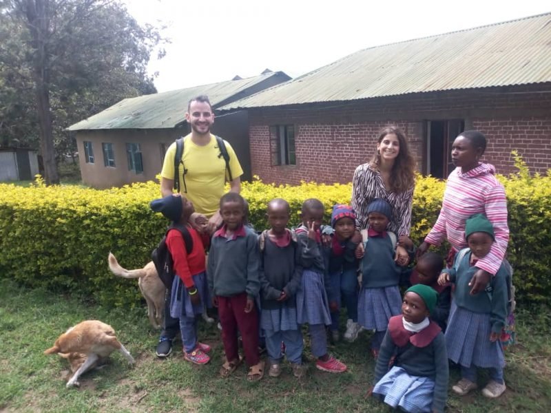 volunteers with Tanzanian students